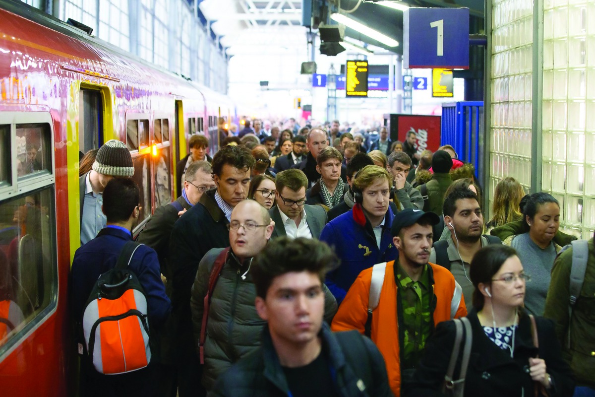 Commuters arrive into London Waterloo station in London yesterday after strike action by Southern Rail caused another morning of travel disruption. Commuters heading into London were hit by another strike on Southern rail, which caused virtually all servi