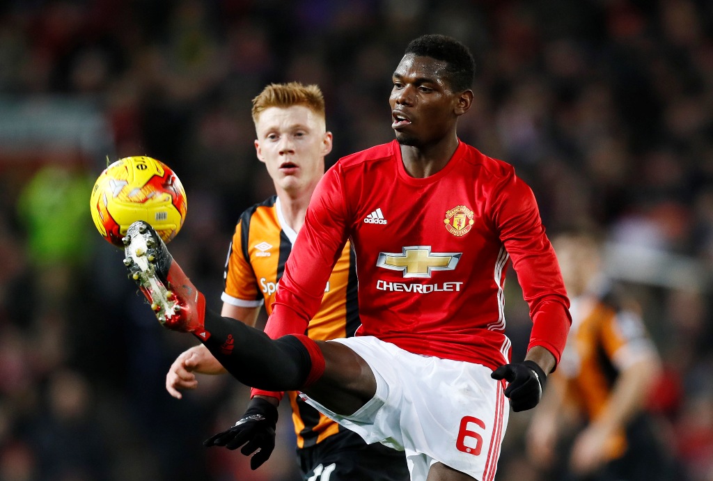 Manchester United's Paul Pogba in action with Hull City's Sam Clucas. Reuters / Jason Cairnduff 
