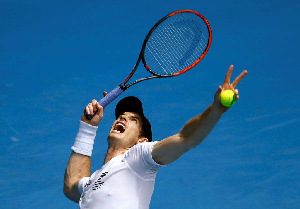 Britain's Andy Murray serves during a training session ahead of the Australian Open tennis tournament in Melbourne, Australia, January 14, 2017. REUTERS/Edgar Su
