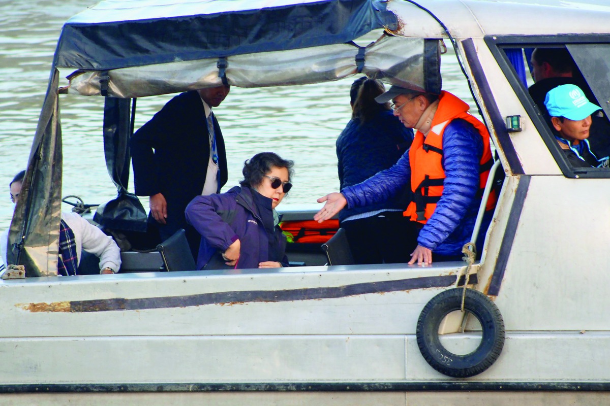 UN special rapporteur on Myanmar Yanghee Lee (centre) departs from Sittwe to visit areas of northern Rakhine State, yesterday