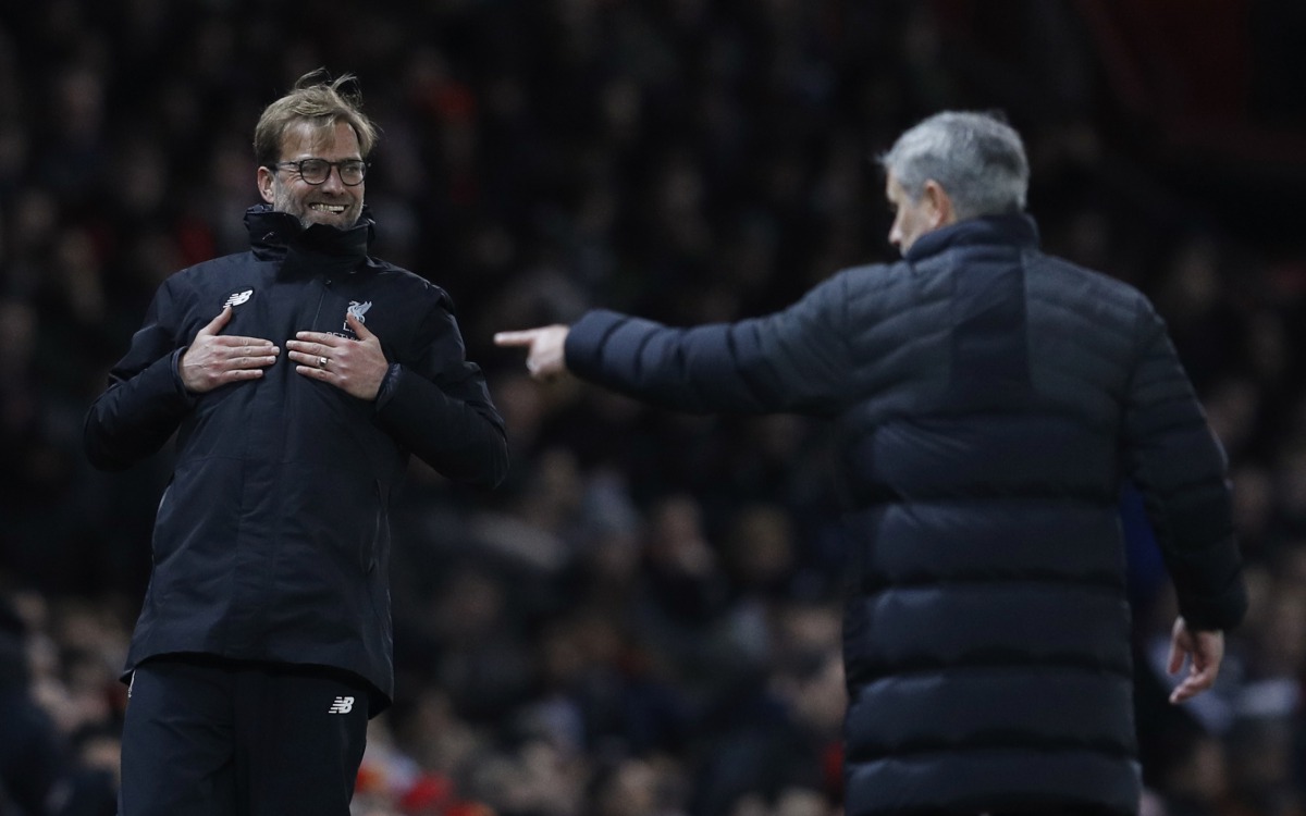 Liverpool manager Juergen Klopp reacts as Manchester United manager Jose Mourinho looks on. (Reuters / Phil Noble)