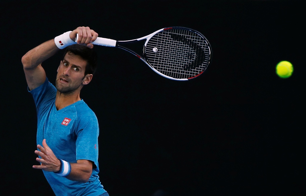 Serbia's Novak Djokovic hits a shot during a training session ahead of the Australian Open tennis tournament, in Melbourne, Australia January 15, 2017. REUTERS/Issei Kato
