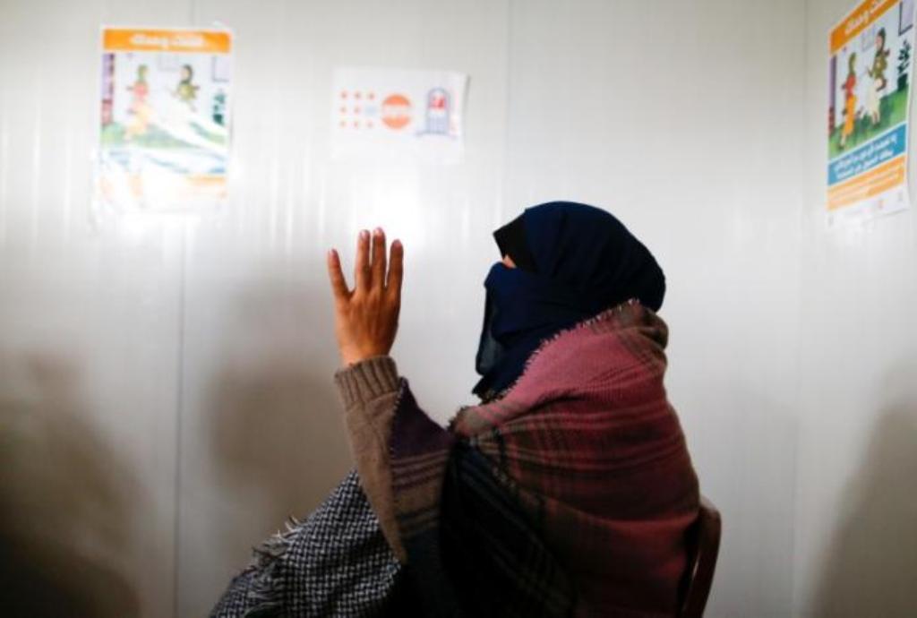 (File photo) A displaced woman who was rescued after being kidnapped by Islamic State militants, gestures at Khazer camp, Iraq, December 20, 2016. REUTERS/Ammar Awad