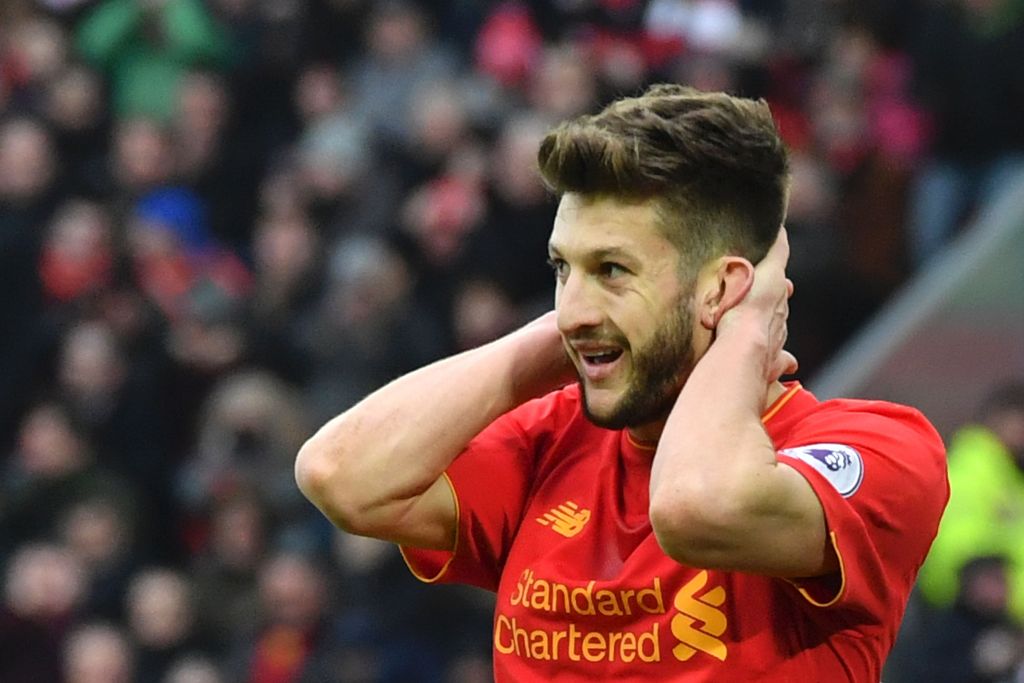 Liverpool's English midfielder Adam Lallana reacts after a missed chance during the English Premier League football match between Liverpool and Swansea City at Anfield in Liverpool, north west England on January 21, 2017. AFP / Anthony DEVLIN