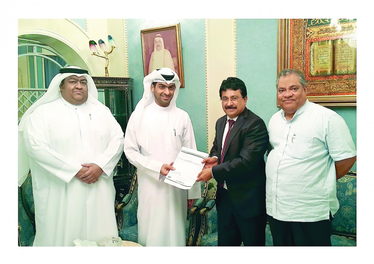 Shamsudheen Olakara (third left), Chairman of Quality Group International receiving the copy of the MoU of Quality Hypermarket in Al Manakh from the sponsor and son of the Deputy Ruler of Sharjah Sheik Khalid bin Ahmed Sultan Al Qasimi.

