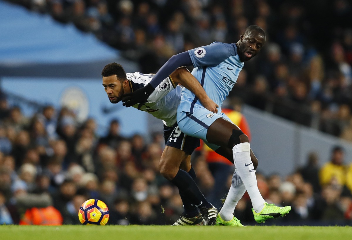 Tottenham's Mousa Dembele in action with Manchester City's Yaya Toure (Reuters / Jason Cairnduff)