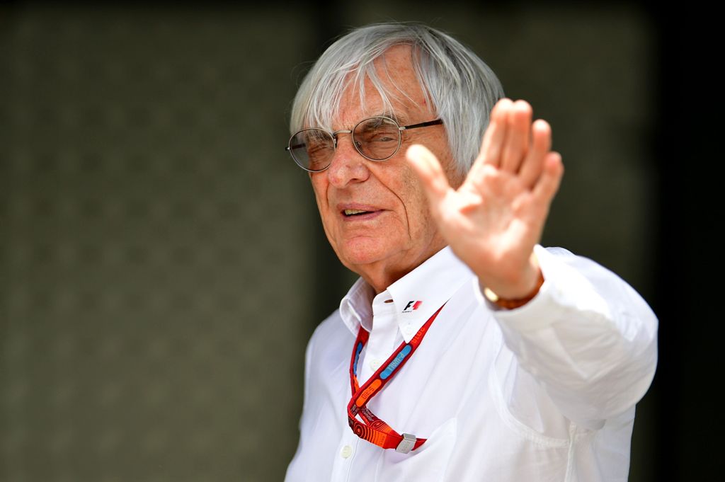 (FILES) This file photo taken on June 18, 2016 shows Formula 1 boss Bernie Ecclestone walking in the paddock at the Baku City Circuit, in Baku, one day ahead of the European Formula One Grand Prix. AFP / ANDREJ ISAKOVIC
