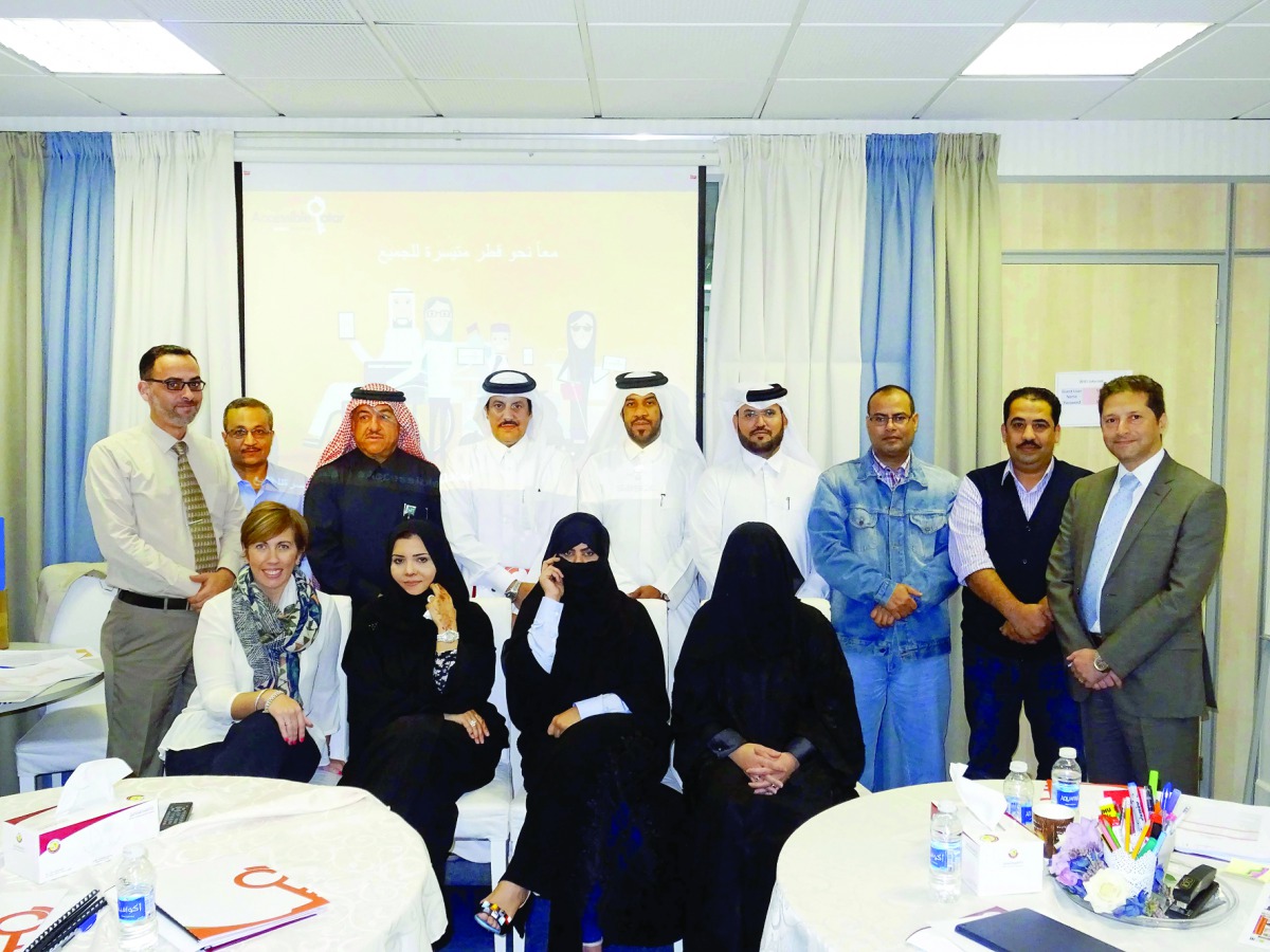 Officials posing for a photo at the workshop held at the Ministry of Education and Higher Education.