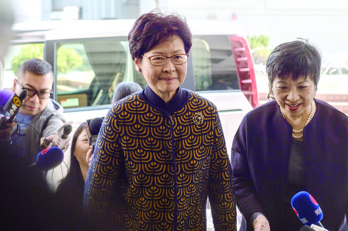 Hong Kong's former deputy leader Carrie Lam arrives at the High Court in Hong Kong, yesterday.