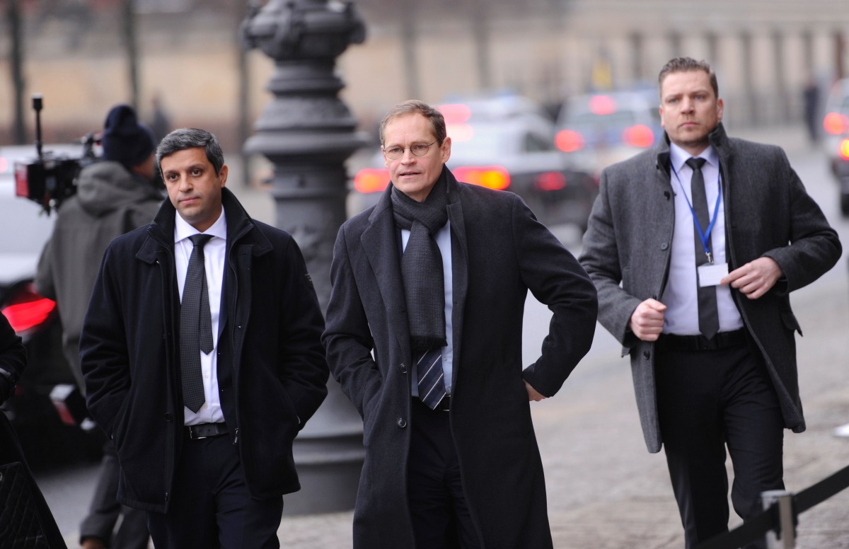 Berlin's mayor Michael Mueller (C) and social democratic member of Berlin's Senate Raed Saleh (L) arrive to attend the state funeral for late former German President Roman Herzog at the Berliner Dom Cathedral in Berlin on January 24, 2017. Roman Herzog, b