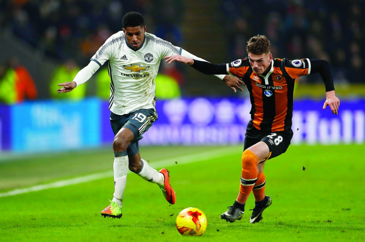  Manchester United's Marcus Rashford in action with Hull City's Josh Tymon during the Cup semi-final second leg at the Kingston Communications Stadium on Thursday.