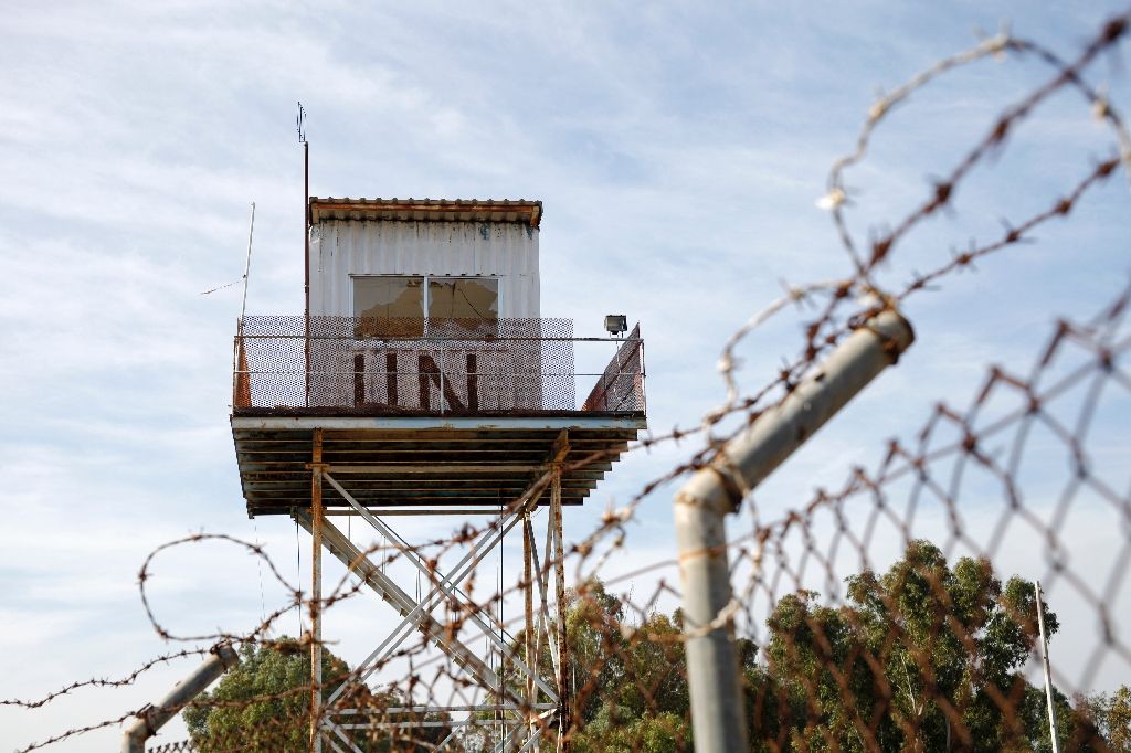 Cyprus has been divided since 1974, when Turkish troops invaded in response to an Athens-inspired coup seeking union with Greece (AFP Photo/Florian CHOBLET)