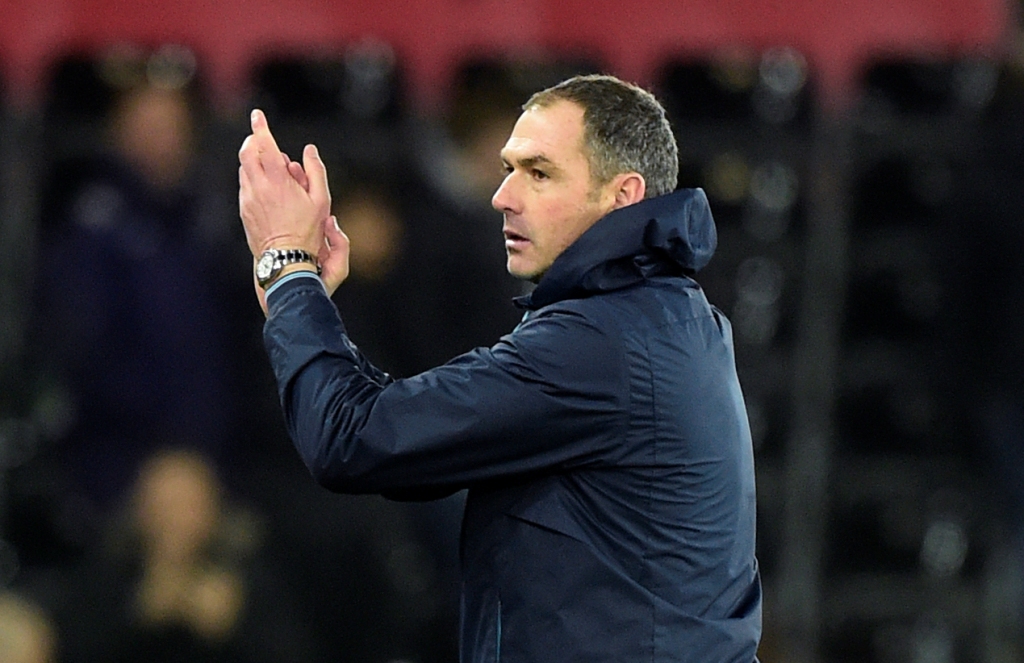 Swansea City manager Paul Clement applauds fans after the game Reuters / Rebecca Naden 
