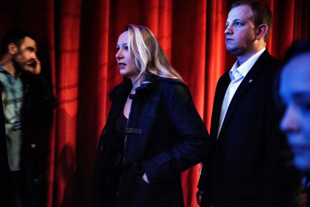 French far-right party Front national (FN) MP Marion Marechal-Le Pen (C) arrives to attend a two-day political rally to kick off the presidential campaign of the FN presidential candidate on February 4, 2017 in Lyon. (AFP / JEFF PACHOUD)