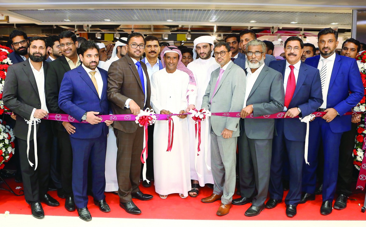 Regency Group Chairman Shamsudheen bin Mohidheen inaugurating Malabar Gold & Diamonds showroom in Dubai at Grand Hyper, Sonapur, in the presence of Shamlal Ahamed, Managing Director – International Operations of Malabar Gold & Diamonds, Abdul Salam KP – G