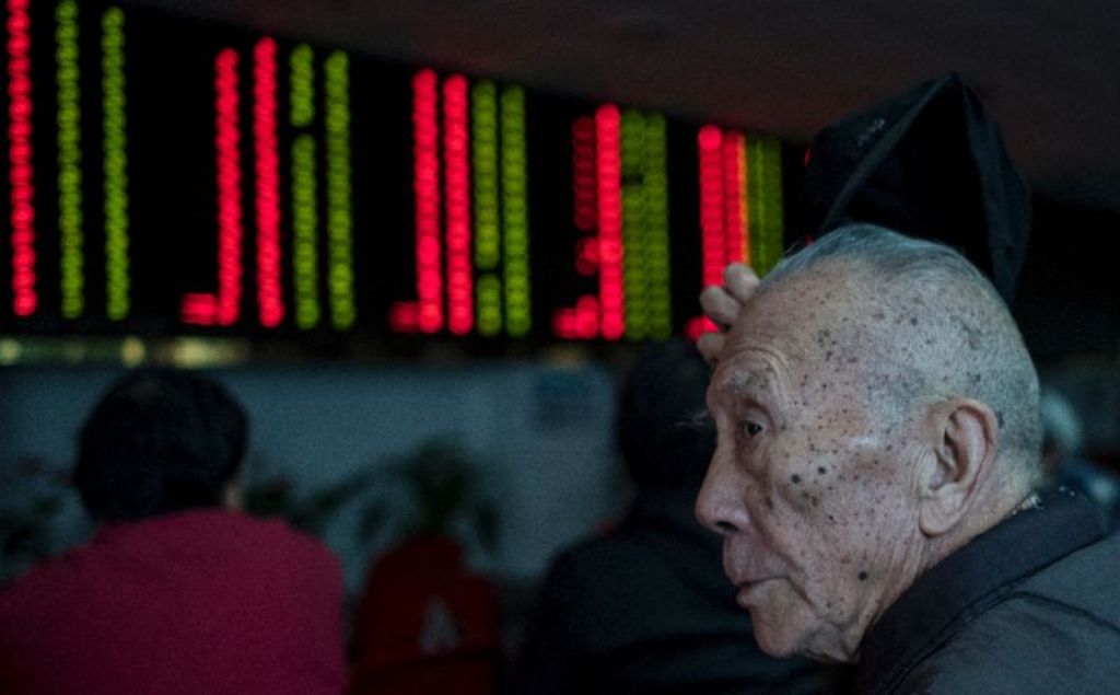 Asia markets inched higher following gains on Wall Street while the dollar continues to face pressure (AFP Photo/JOHANNES EISELE).