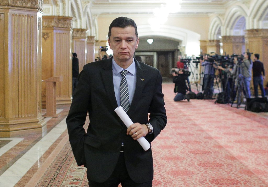 Romania's Prime Minister Sorin Grindeanu leaves a meeting of the Social Democrat Party (PSD) at the parliament in Bucharest, Romania, February 6, 2017. Inquam Photos/Octav Ganea