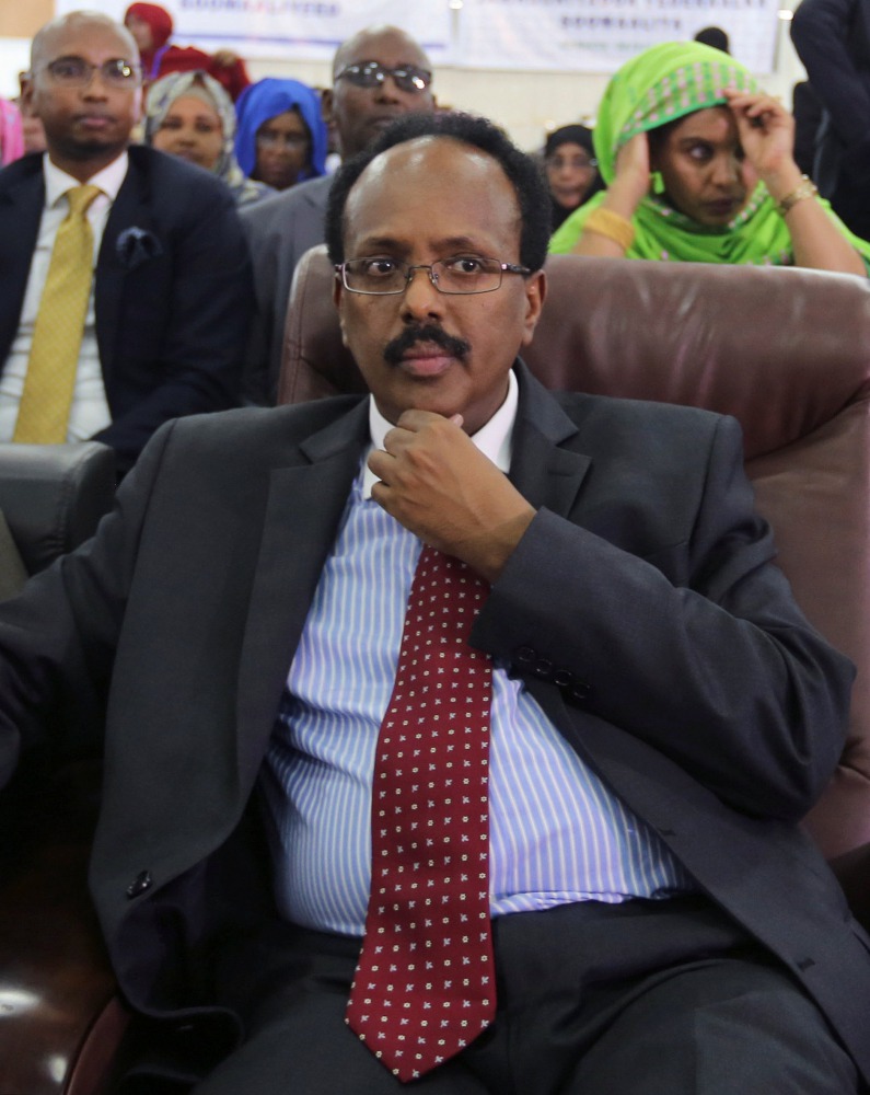 Somali Presidential candidate Minister Mohamed Abdullahi Farmajo follows the proceedings as lawmakers cast their ballot during the presidential vote at the airport in Somalia's capital Mogadishu, February 8, 2017. REUTERS/Feisal Omar