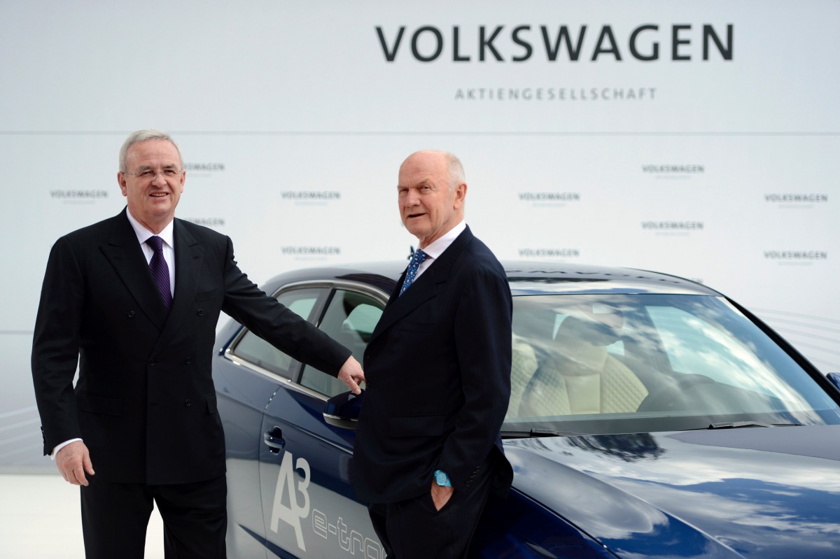 This file photo taken on April 23, 2012 shows Volkswagen CEO Martin Winterkorn (L) and Chairman of the supervisory board of Volkswagen Ferdinand Piech posing at an Audi A3 electric car during a signing ceremony and a visit to the Volkswagen plant in Wolfs