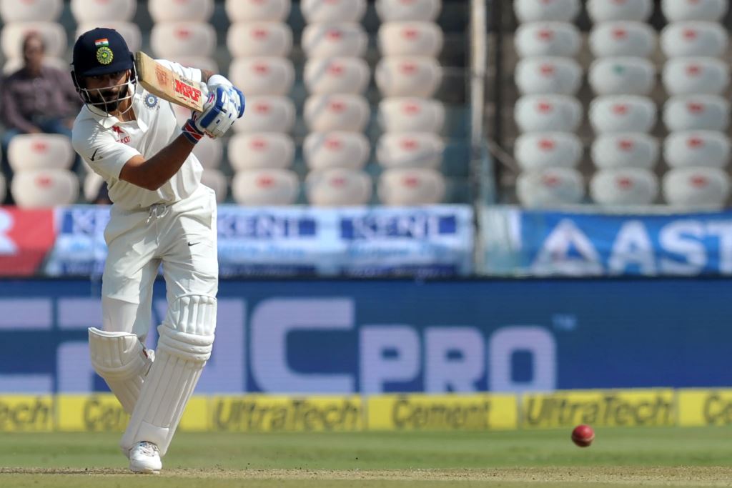 India's captain Virat Kohli plays a shot during the second day of the Test cricket match between India and Bangladesh at The Rajiv Gandhi International Cricket Stadium in Hyderabad on February 10, 2017. AFP / NOAH SEELAM