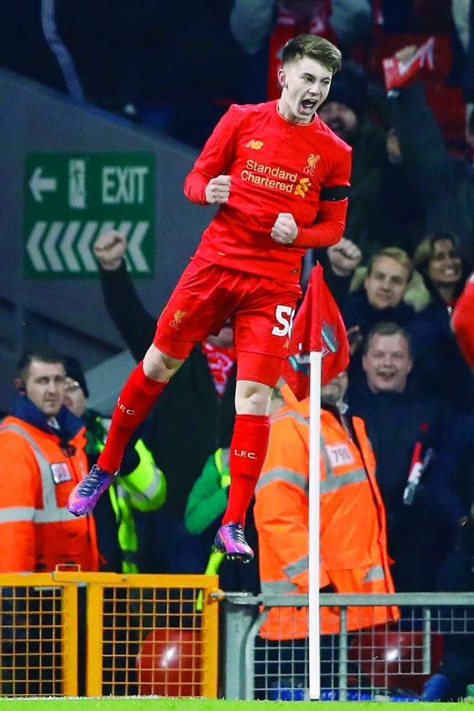 Liverpool's Ben Woodburn celebrates scoring their second goal against Leeds United during their League Cup match at Anfield, in this file picture of December 2016.