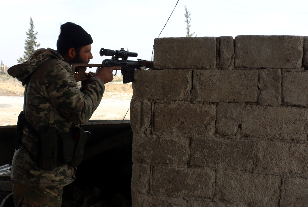 A member of Free Syrian Army attacks to Islamic State positions in al-Bab town of Aleppo as they advance to al-Bab town of Aleppo during the 