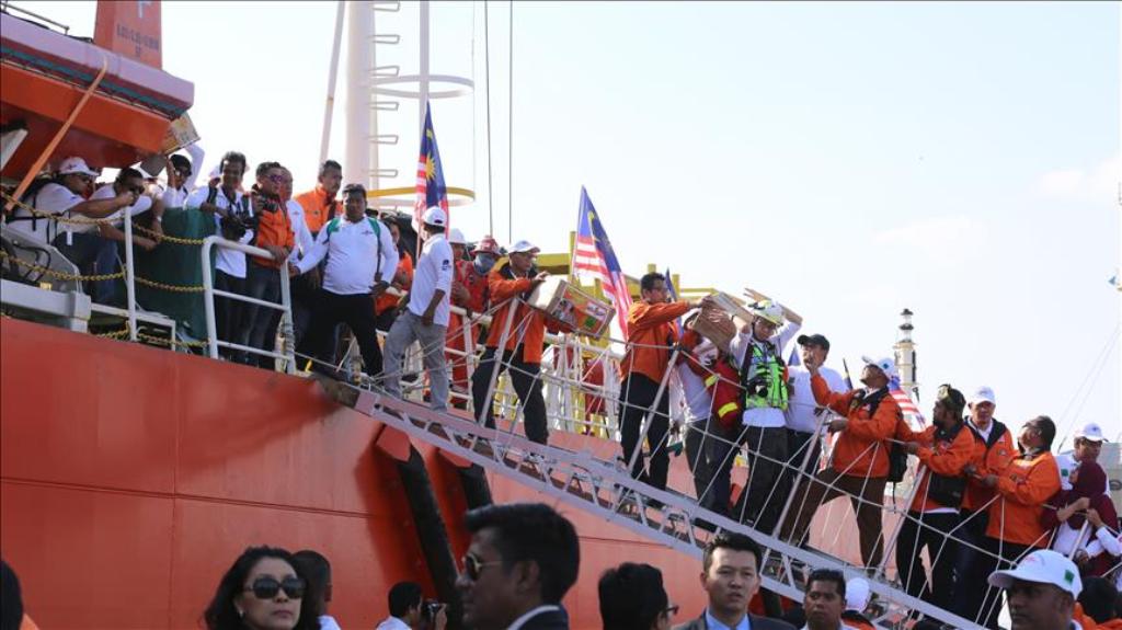 Members of Malaysian NGO unload the food and humanitarian aids for Rohingya Muslims from the ship docked at Thilawa Port outskirt of Yangon, Myanmar on February 9, 2017.