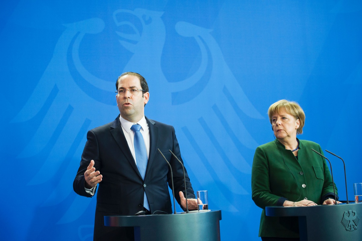 German Chancellor Angela Merkel and Tunisian Prime Minister Youssef Chahed adress the media after a meeting at the Chancellery in Berlin on February 14, 2017. German Chancellor Angela Merkel is expected to press Tunisia's Prime Minister Youssef Chahed to 
