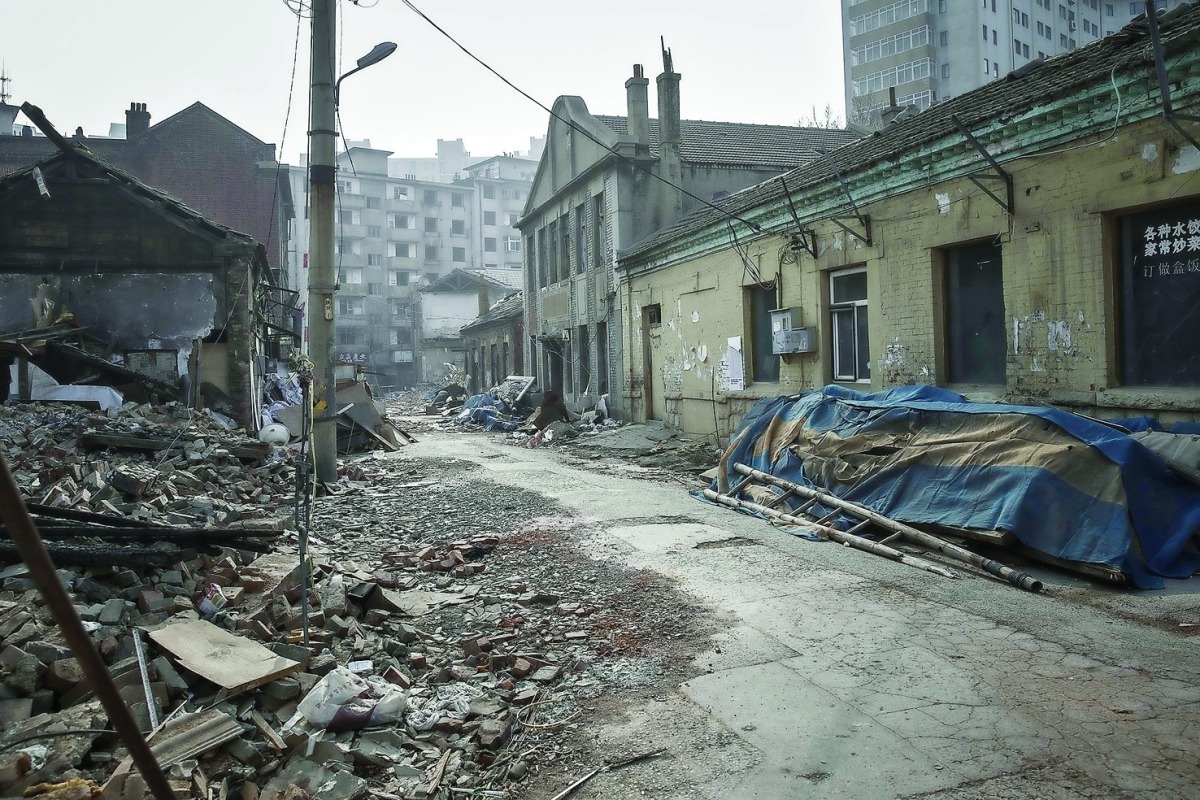 Derelict buildings stand in a neighbourhood that is slated for demolition and redevelopment in Dalian, China.