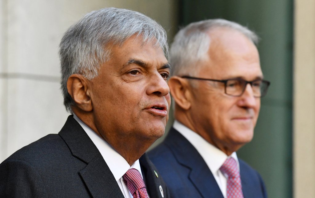 Sri Lanka's Prime Minister Ranil Wickremesinghe (L) and Australia's Prime Minister Malcolm Turnbull participate in a press conference at Parliament House in Canberra, Australia, February 15, 2017. AAP/Mick Tsikas/via REUTERS
