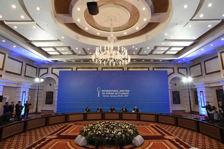 File Photo of Kazakh Foreign Minister Kairat Abdrakhmanov (C) reads a final statement on Syria peace talks as UN envoy for Syria Staffan de Mistura (R) looks through his papers in Astana on January 24, 2017.  (AFP / Kirill KUDRYAVTSEV)