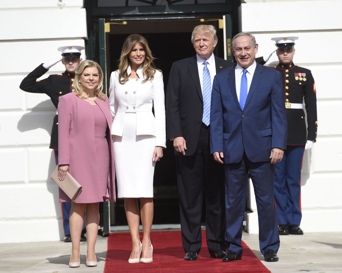 US President Donald Trump and First Lady Melania Trump welcome Israeli Prime Minister Benjamin Netanyahu and his wife, Sara, as they arrive at the White House in Washington, DC, February 15, 2017. AFP / Saul Loeb