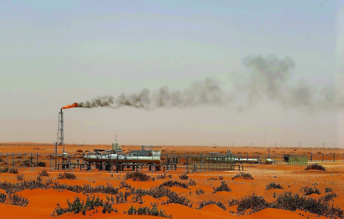 A file picture shows a flame from a Saudi Aramco oil installion known as “Pump 3” near the oil-rich area of Khouris, 160 kilometres east of the Saudi capital Riyadh.