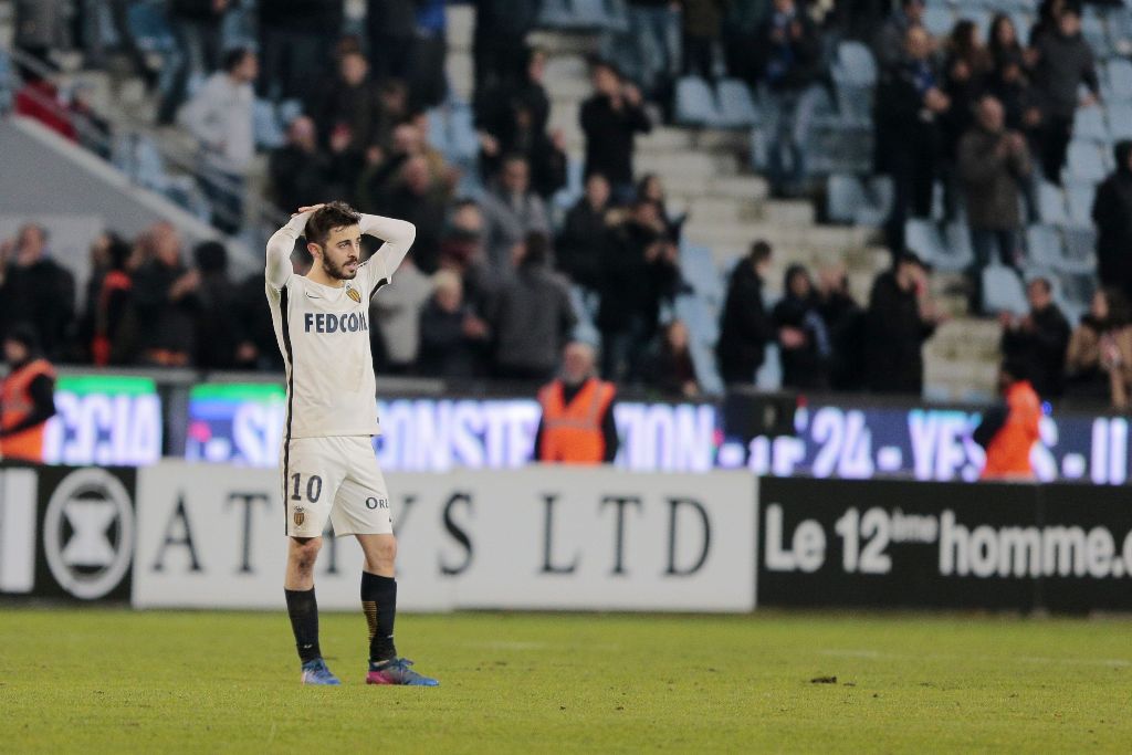 Monaco's Portuguese midfielder Bernardo Silva reacts after the L1 football match Bastia (SCB) against Monaco (ASM) on February 17, 2017 in the Armand Cesari stadium in Bastia on the French Mediterranean island of Corsica. / AFP / PASCAL POCHARD-CASABIANCA