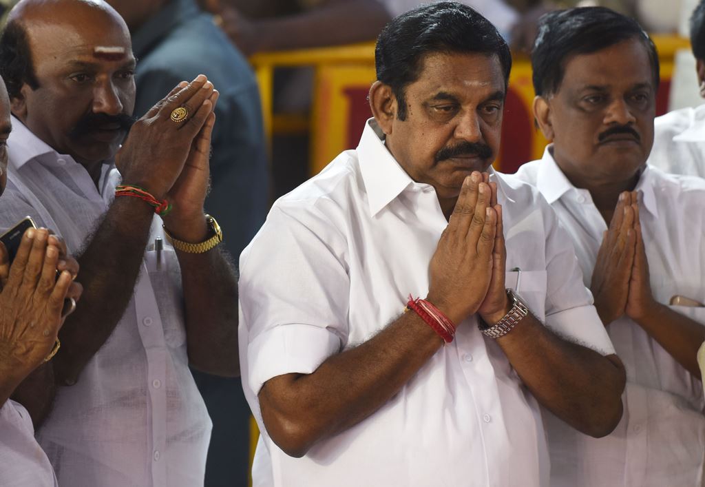 AIADMK party leader Edappadi Palanisamy gestures as he pays his respects at the memorial for former state chief minister Jayalalithaa Jayaram after being sworn in as the Chief Minister of the state of Tamil Nadu in Chennai on February 16, 2017. AFP / ARUN