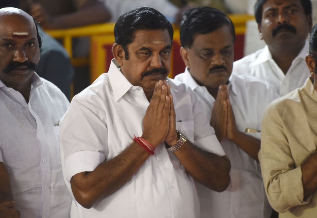 (FILES) In this photograph taken on February 16, 2017, All India Anna Dravida Munnetra Kazhagam (AIADMK) party leader Edappadi Palanisamy (C) gestures as he pays his respects at the memorial for former state chief minister Jayalalithaa Jayaram after being