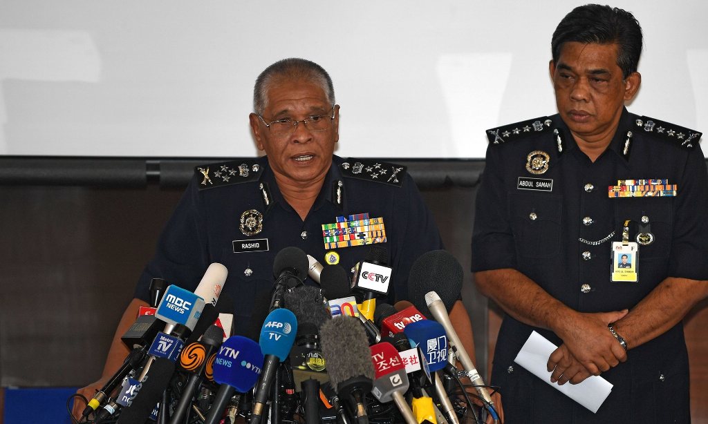  Malaysian Police deputy inspector-general Noor Rashid Ibrahim (L) speaks during a press conference as Selangor state police chief Abdul Samah Mat looks on. Photograph: Mohd Rasfan/AFP.