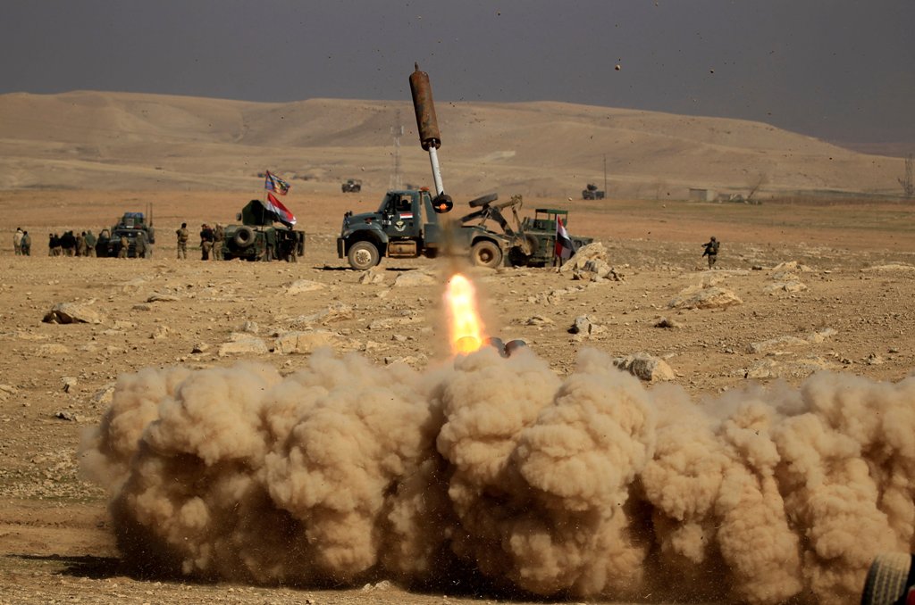 Members of the Iraqi rapid response forces fire a missile toward Islamic State militants during a battle in the south of Mosul, Iraq February 19, 2017. REUTERS/Zohra Bensemra TPX IMAGES OF THE DAY.