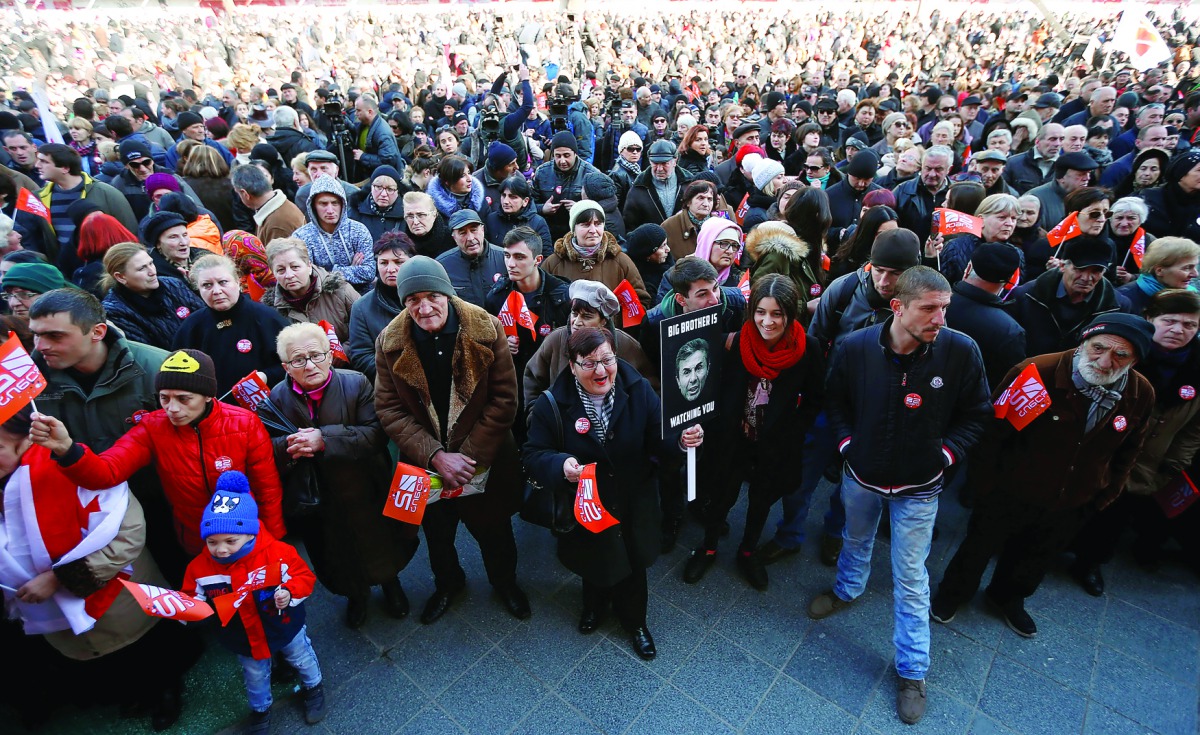 People attend a rally to support opposition TV channel Rustavi 2 in Tbilisi, yesterday.