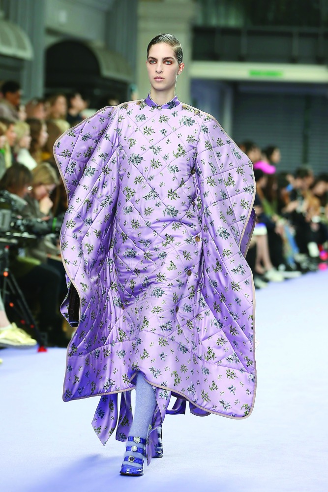 Models present creations by Mulberry during their catwalk show on the third day of the Autumn/Winter 2017 London Fashion Week at the Old Billingsgate market in London, yesterday.