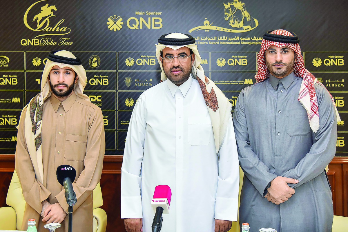 Hussain Akbar Al Baker, Director of Marketing and Communications Department at United Development Company (UDC), is seen with Saeed bin Mohammed Al-Shafi, Secretary General of Qatar Equestrian Federation (QEF), after a sponsorship signing ceremony, in Doh