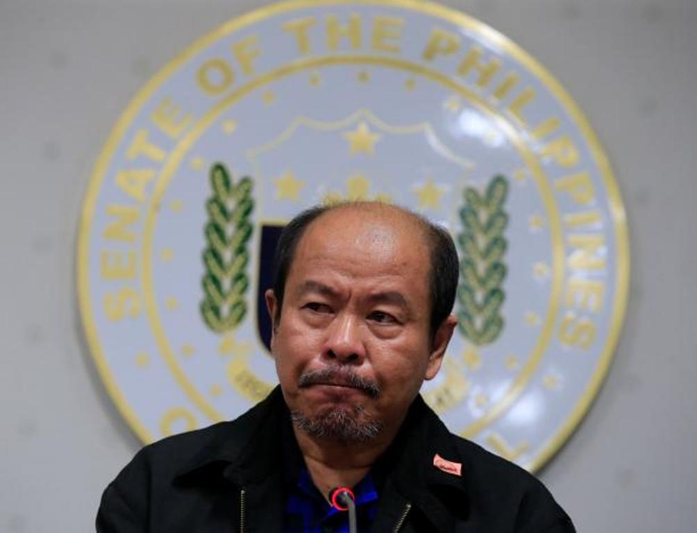 Arturo Lascanas, a retired Davao policeman, speaks during a news conference at the Senate headquarters in metro Manila, Philippines February 20, 2017. REUTERS/Romeo Ranoco.