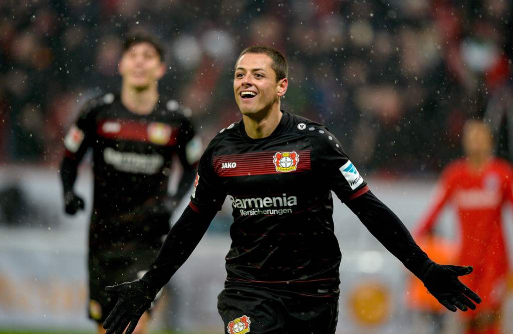 (FILES) This file photo taken on February 11, 2017 shows Leverkusen's Mexican forward Javier Hernandez (Chicharito) celebrating after scoring his 2-0 during the German First division Bundesliga football match between Bayer Leverkusen and Eintracht Frankfu