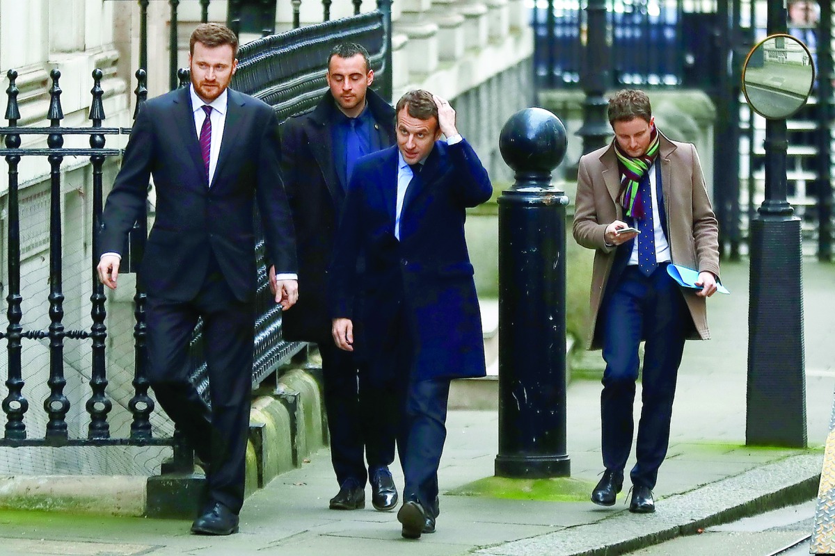 French presidential candidate for the En Marche! movement, Emmanuel Macron, arrives at 10 Downing Street in central London yesterday to meet British Prime Minister Theresa May.