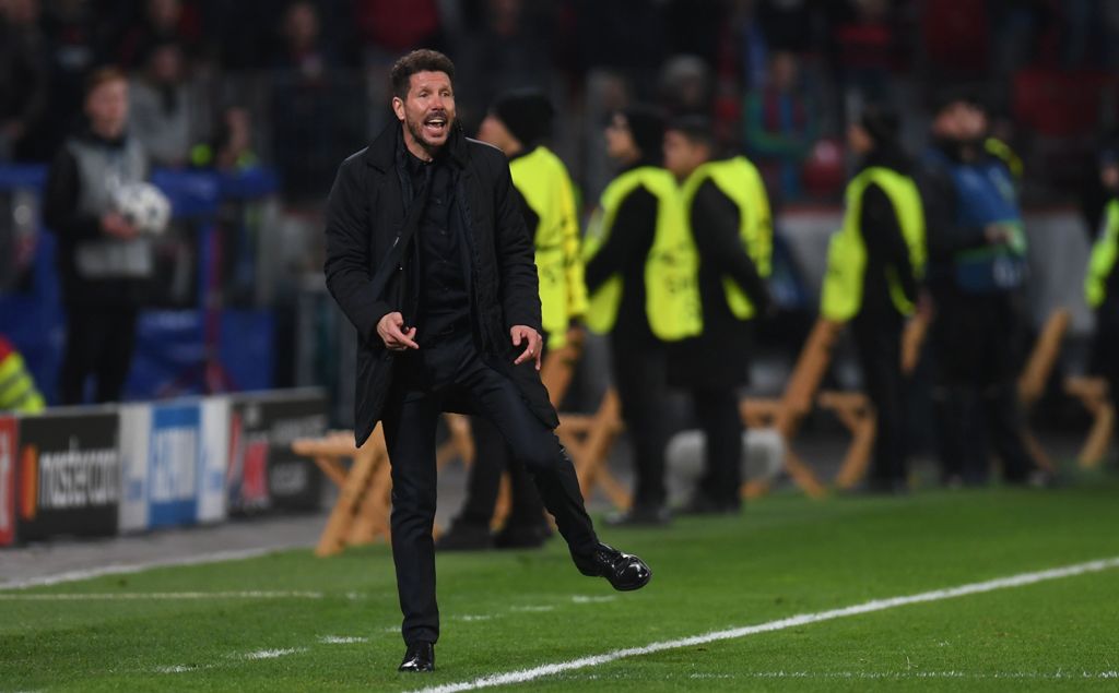 Atletico Madrid's Argentinian coach Diego Simeone reacts during the UEFA Champions League round of 16 first-leg football match between Bayer 04 Leverkusen and Club Atletico de Madrid in Leverkusen, western Germany on February 21, 2017. / AFP / PATRIK STOL