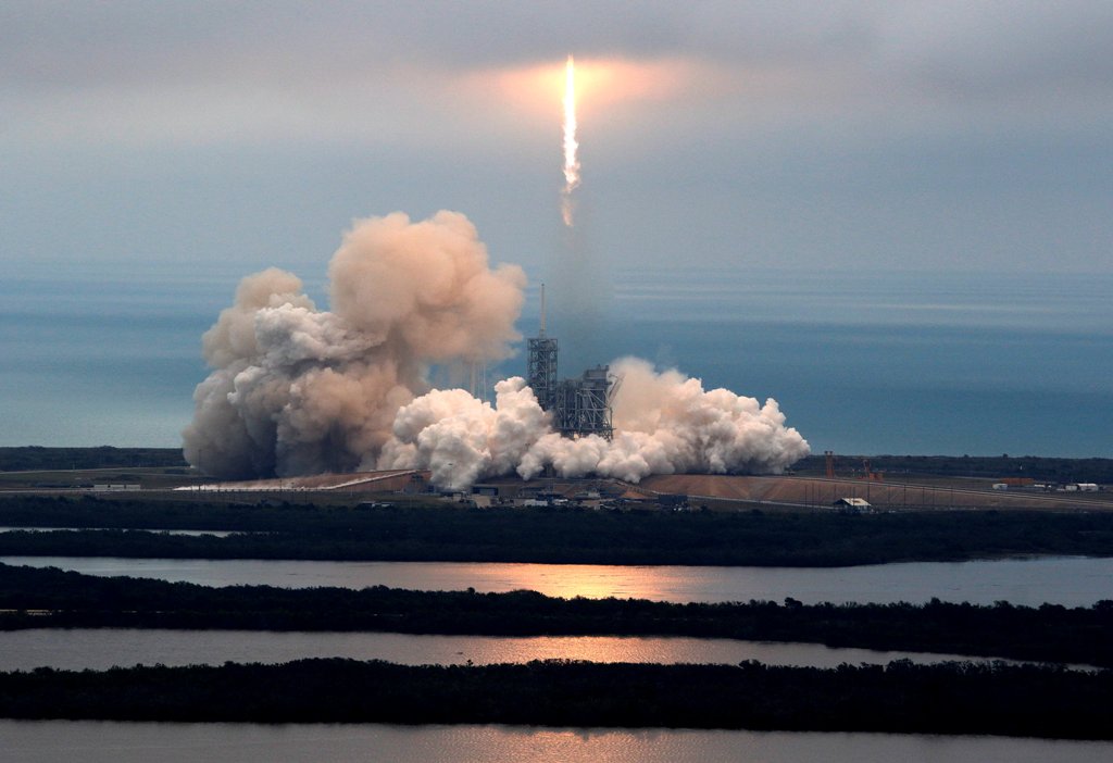 A SpaceX Falcon 9 rocket disappears into clouds after it lifted off on a supply mission to the International Space Station from historic launch pad 39A at the Kennedy Space Center in Cape Canaveral, Florida, U.S., February 19, 2017. REUTERS/Joe Skipper
