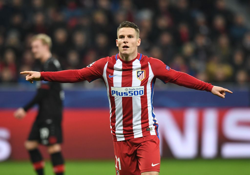 Atletico Madrid's French forward Kevin Gameiro celebrate after scoring a penalty during the UEFA Champions League round of 16 first-leg football match between Bayer 04 Leverkusen and Club Atletico de Madrid in Leverkusen, western Germany on February 21, 2