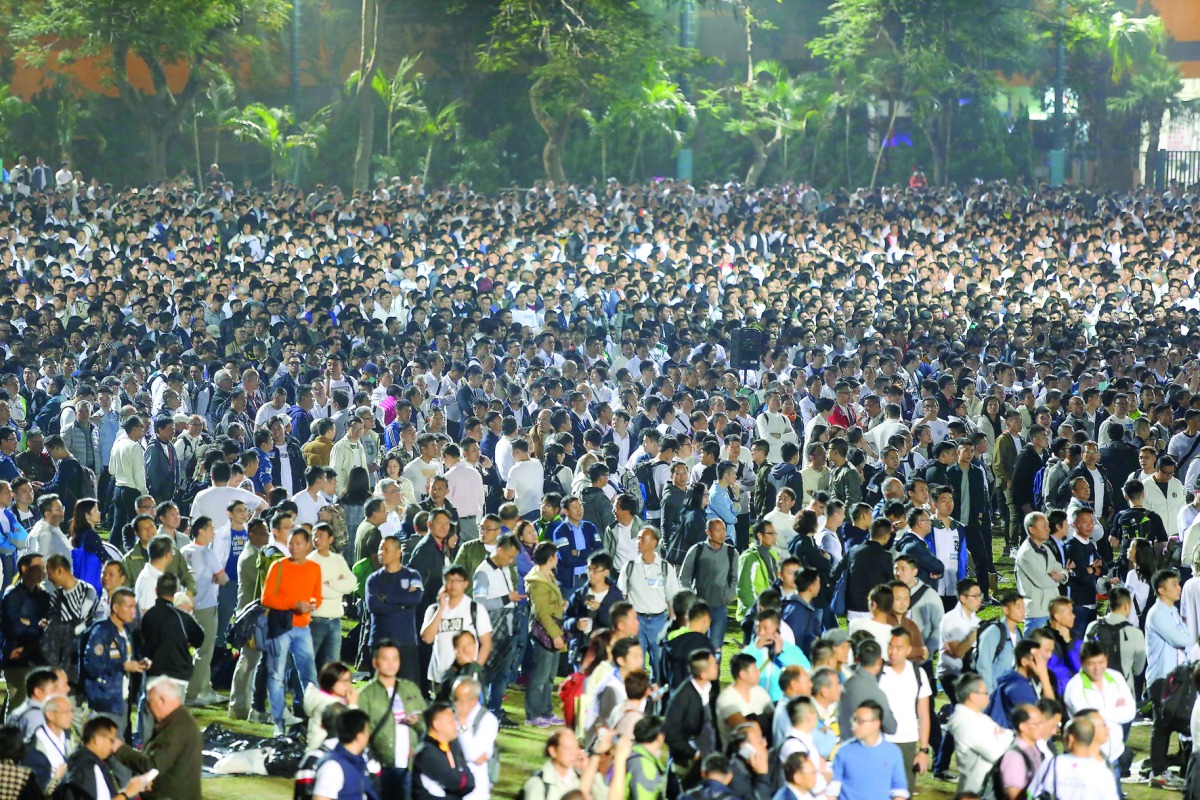 Police officers and supporters gathering on a football pitch inside the Police Sports and Recreation Club in Kowloon Tong, in Hong Kong, yesterday.