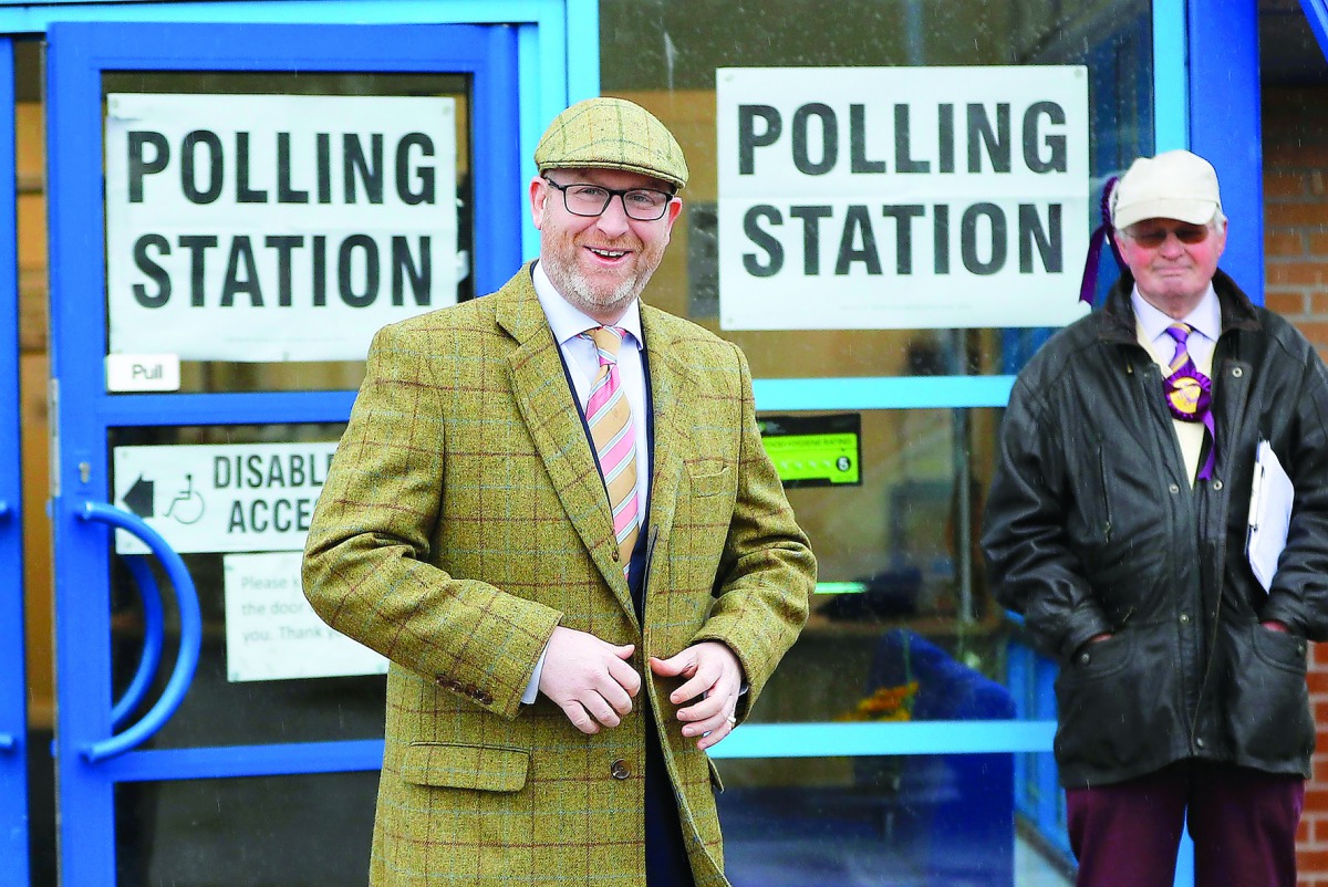 United Kingdom Independence Party leader Paul Nuttall leaves after casting his vote in Stoke-on-Trent, yesterday.