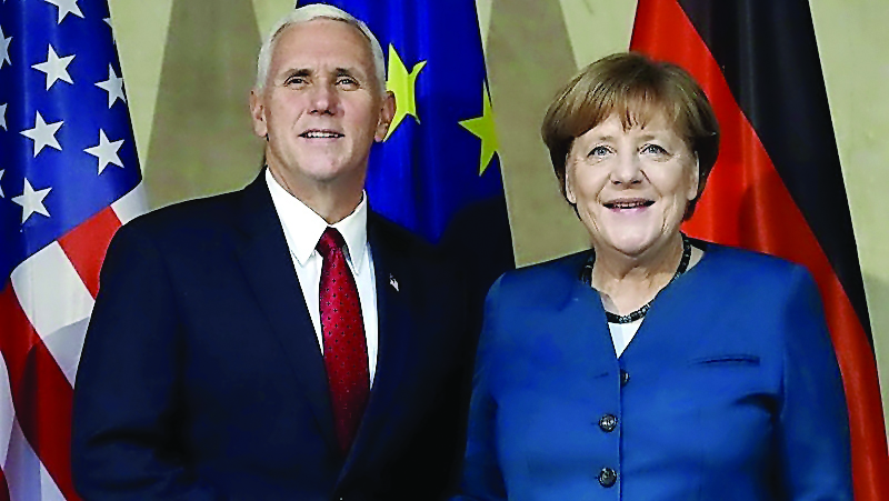 US Vice-President Mike Pence and German Chancellor Angela Merkel at Munich conference.